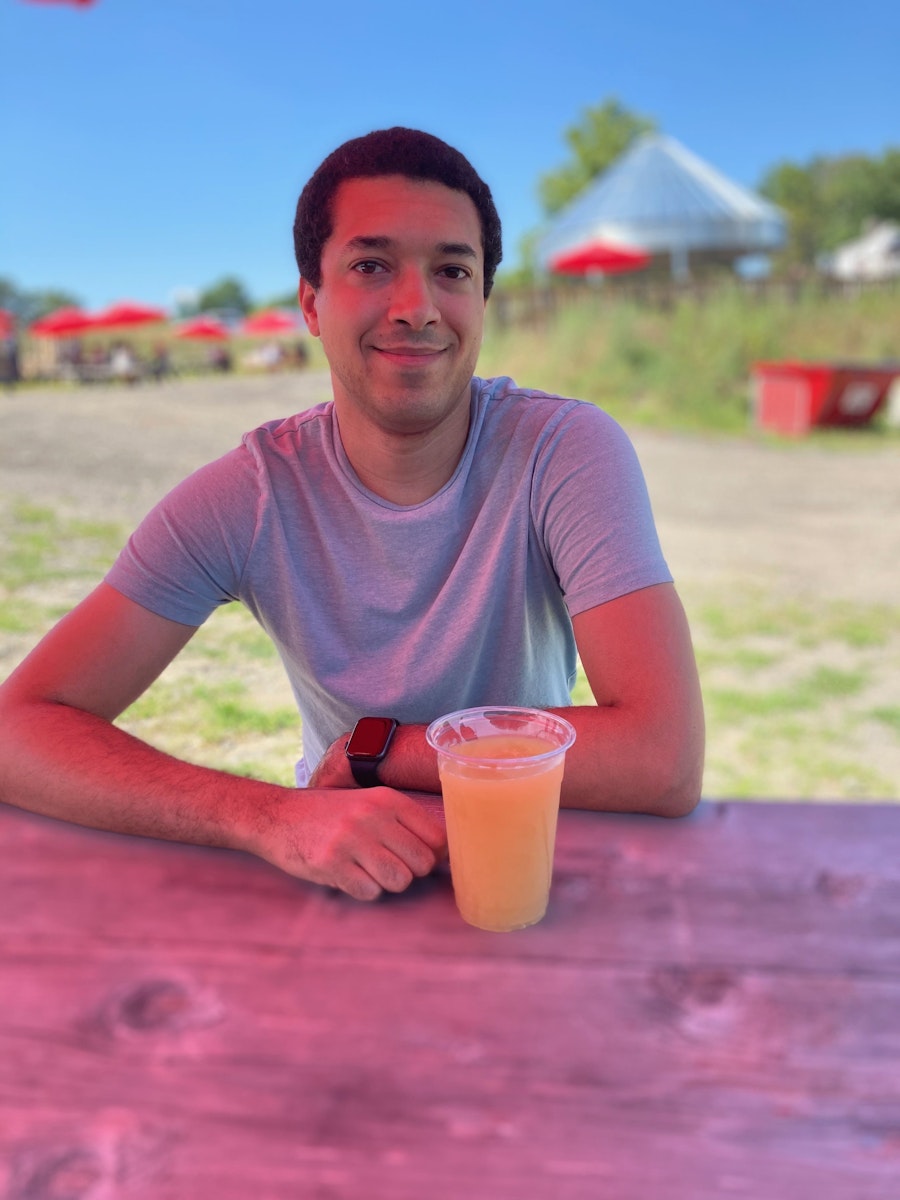 Ryan enjoying a cold beer outside